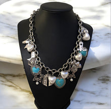  Silver and Turquoise Charm Necklace
